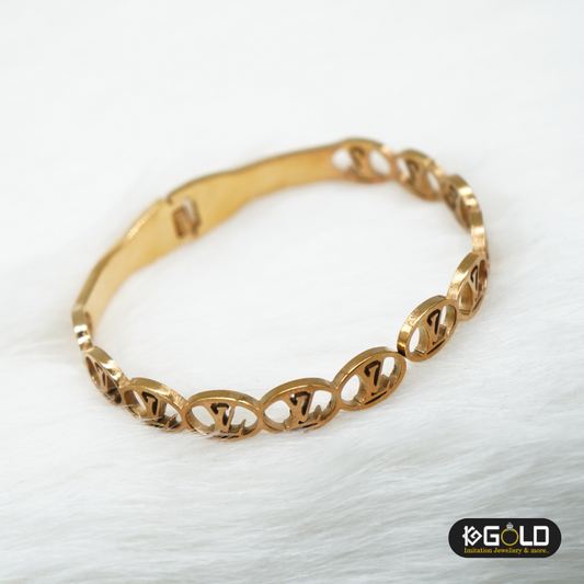 Louis Vuitton Sophisticated Golden Bracelet - LB001. imitation jewellary on 1ggold.in