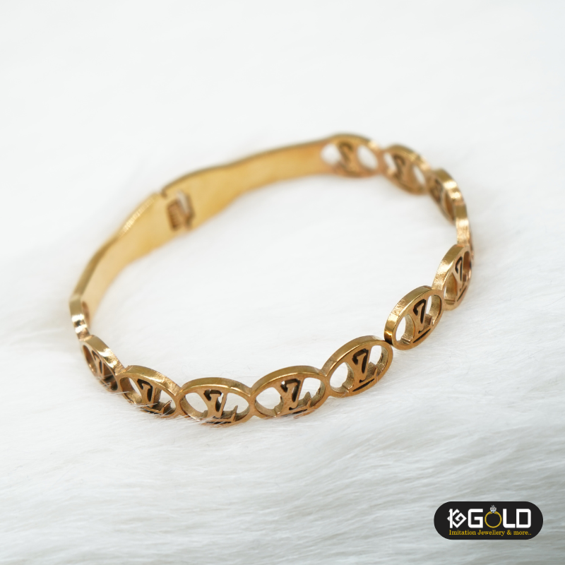 Louis Vuitton Sophisticated Golden Bracelet - LB001. imitation jewellary on 1ggold.in 